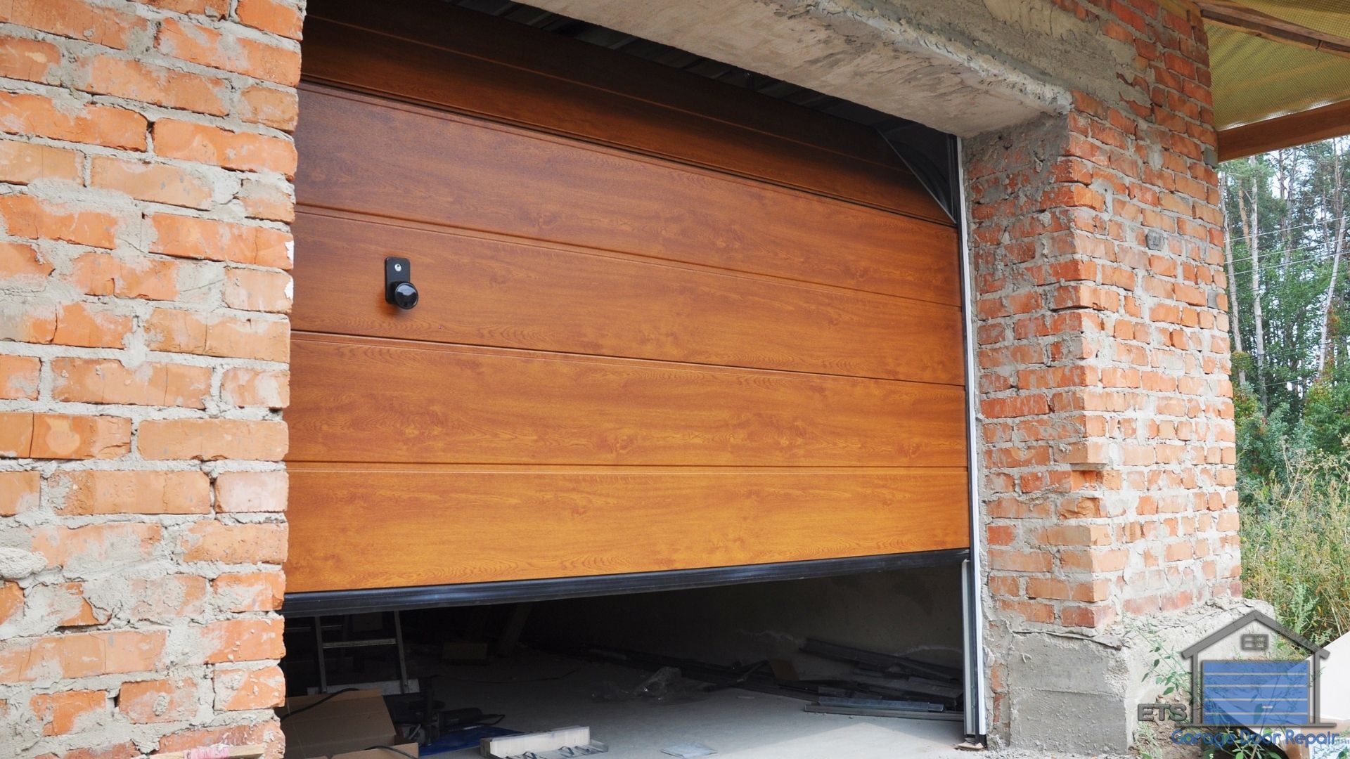 Other Mechanical Issues to Consider - Why does my garage door go down then back up?