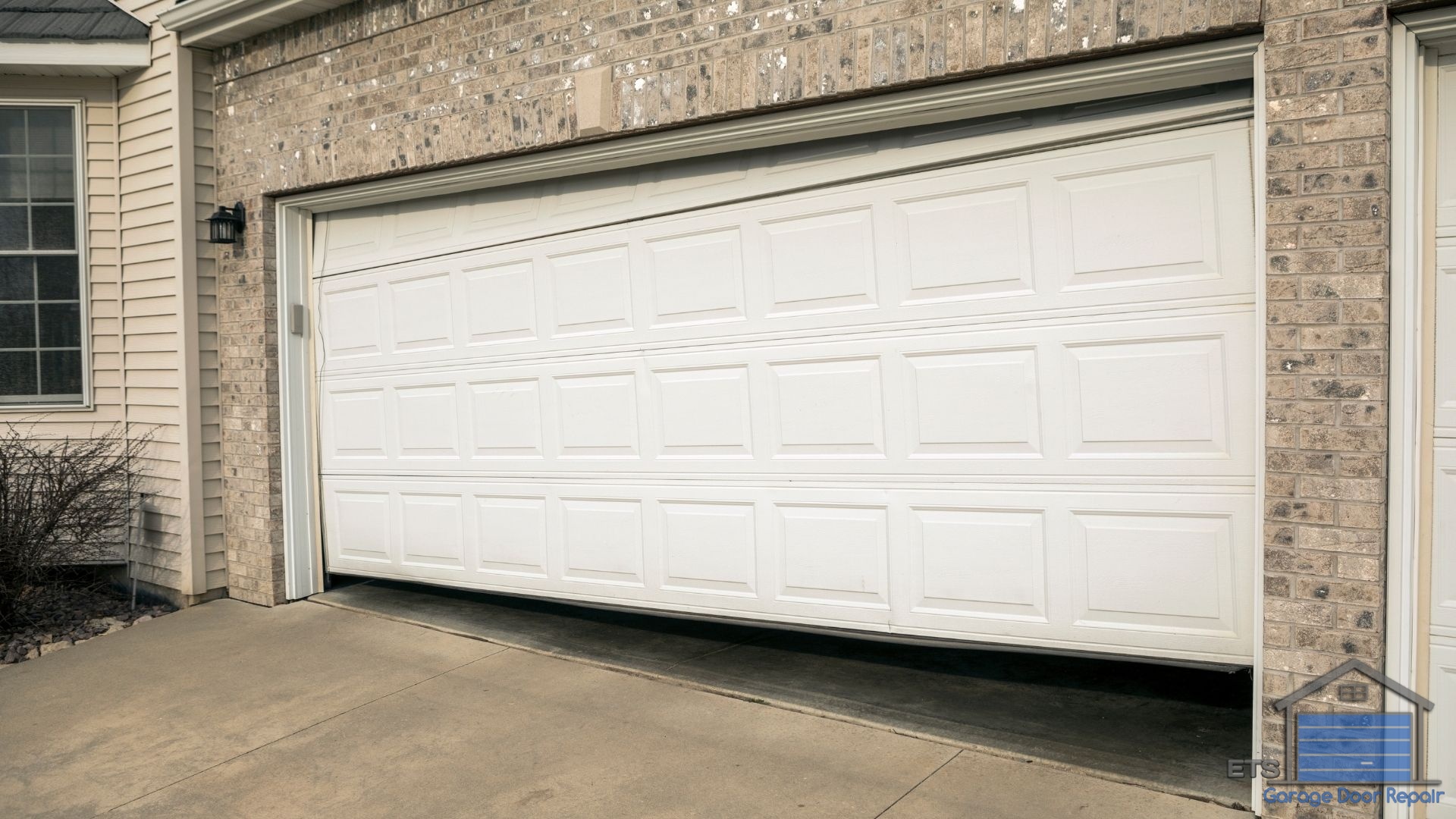 How Damage Location Affects Your Decision - Can You Replace Just One Panel of a Garage Door?