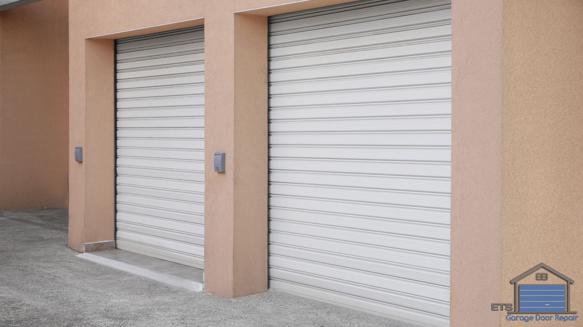 How Do Maintenance Requirements Compare? - Roll-Up Doors vs. Sectional Doors for Business Units