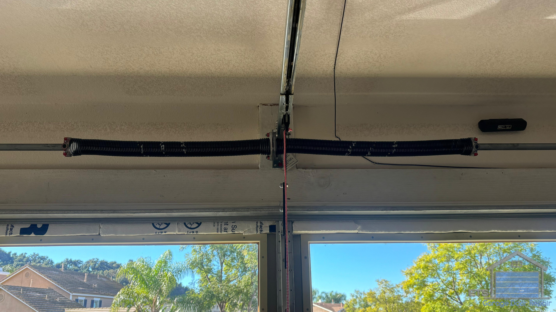 Understanding the Two Types of Garage Door Springs - Extension vs. Torsion Springs: What's the Difference?